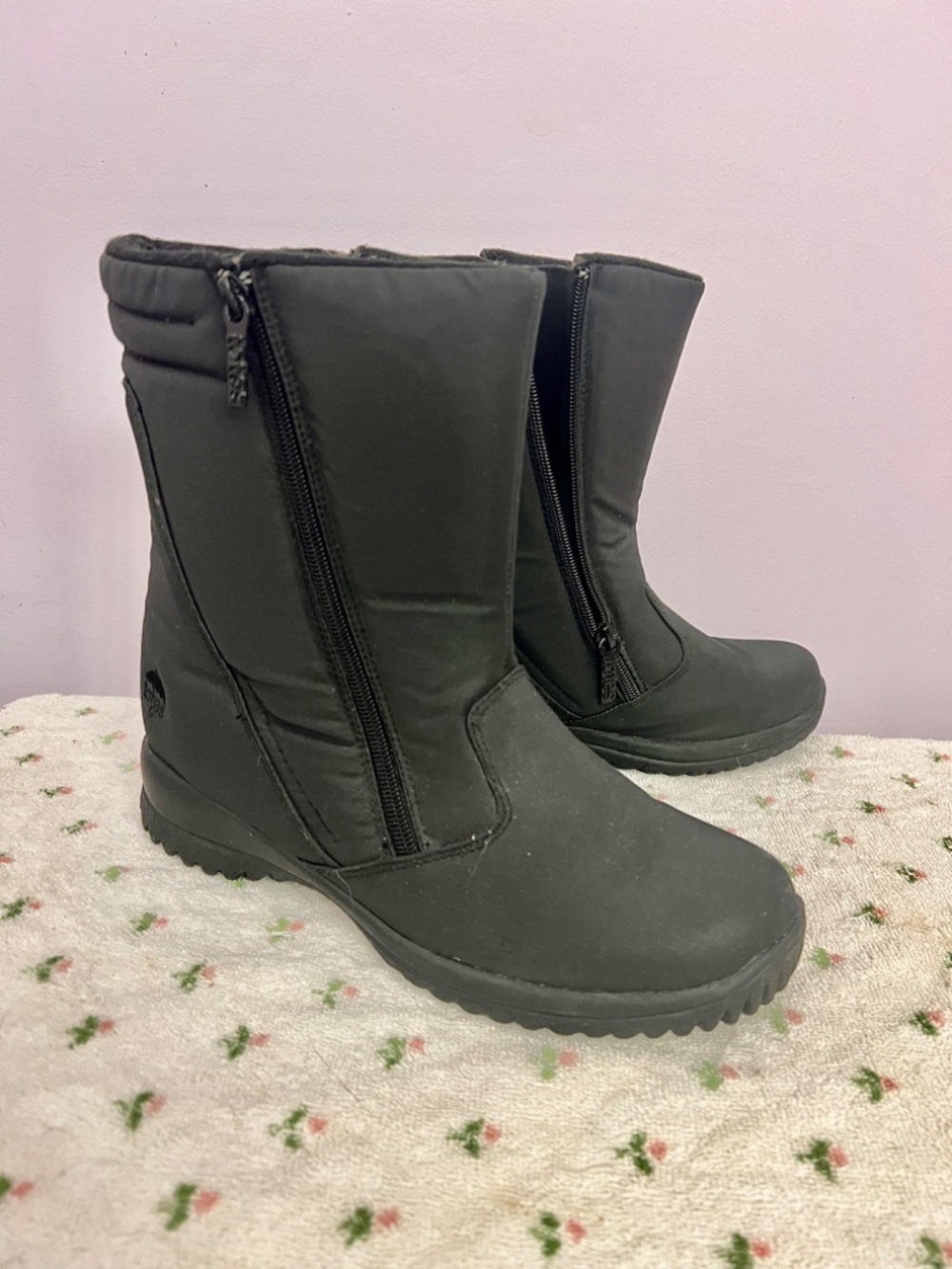 Black fleece lined rain boots in new condition